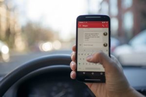What to Cut Your Car Insurance Costs? Stop Texting and Driving
